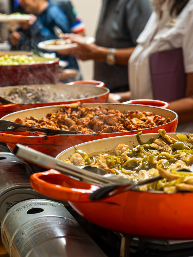 Catering staff preparing an event buffet