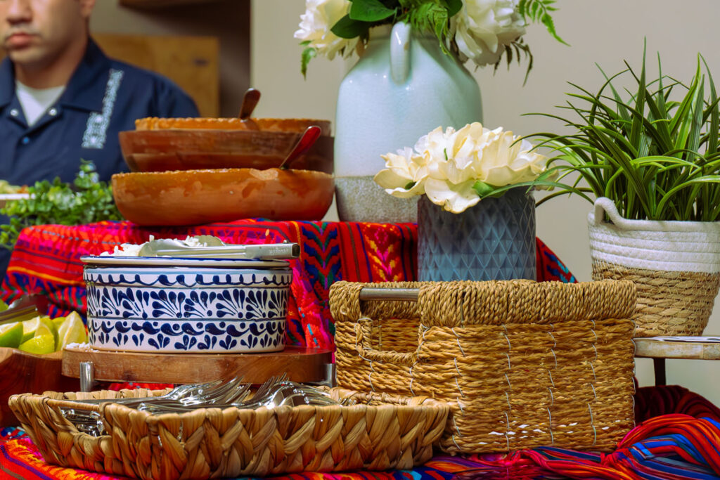 Cazuelita's catering display with Mexican serving dishes